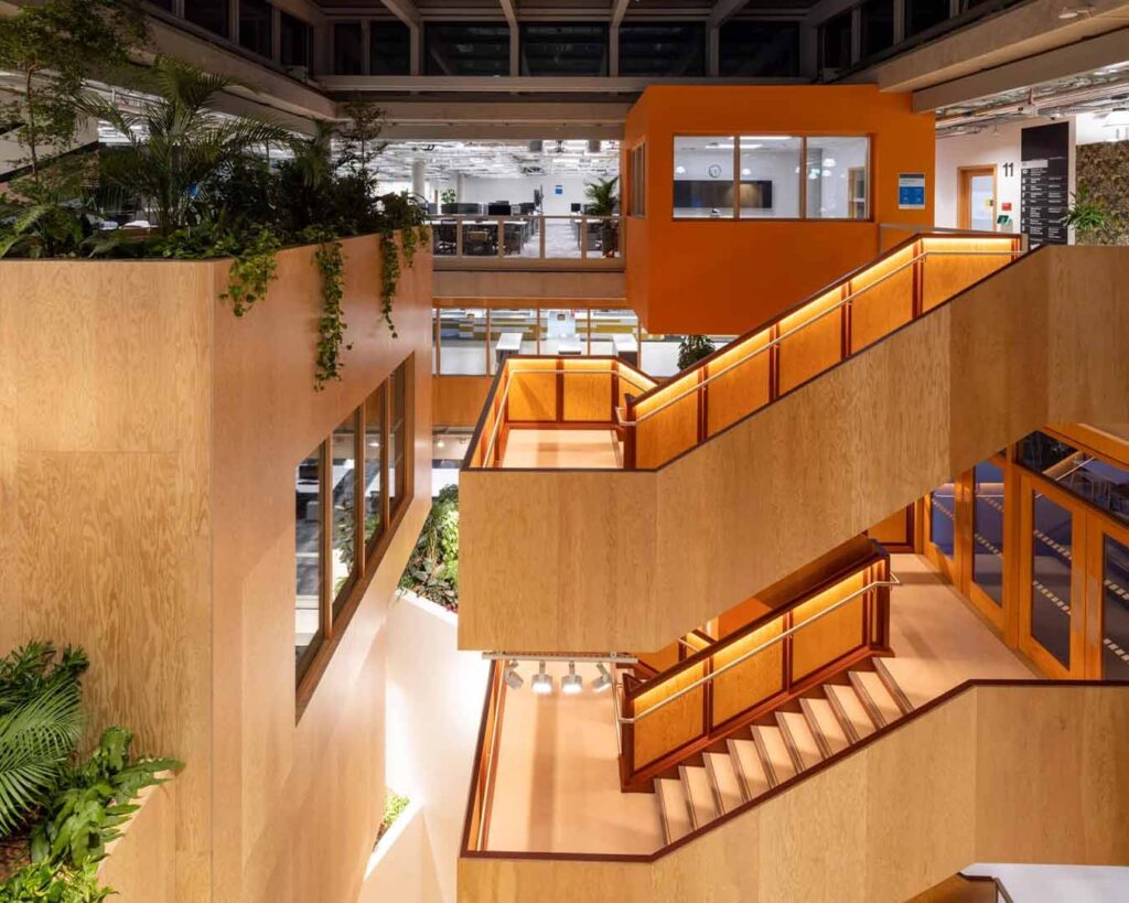 Meta Office London, UK. Interior landscaping service with box planting and hanging plant designs
